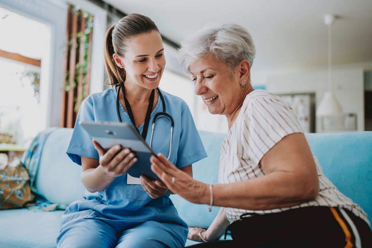 Image of patient looking at screen with a practitioner